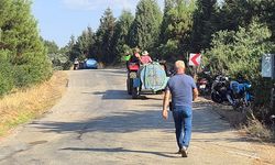 Traktörünü ve su tankerini alan yangına koştu