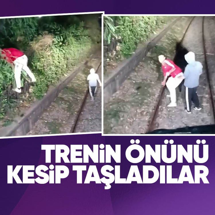 Hareket halindeki trenin önünü kesip taşladılar